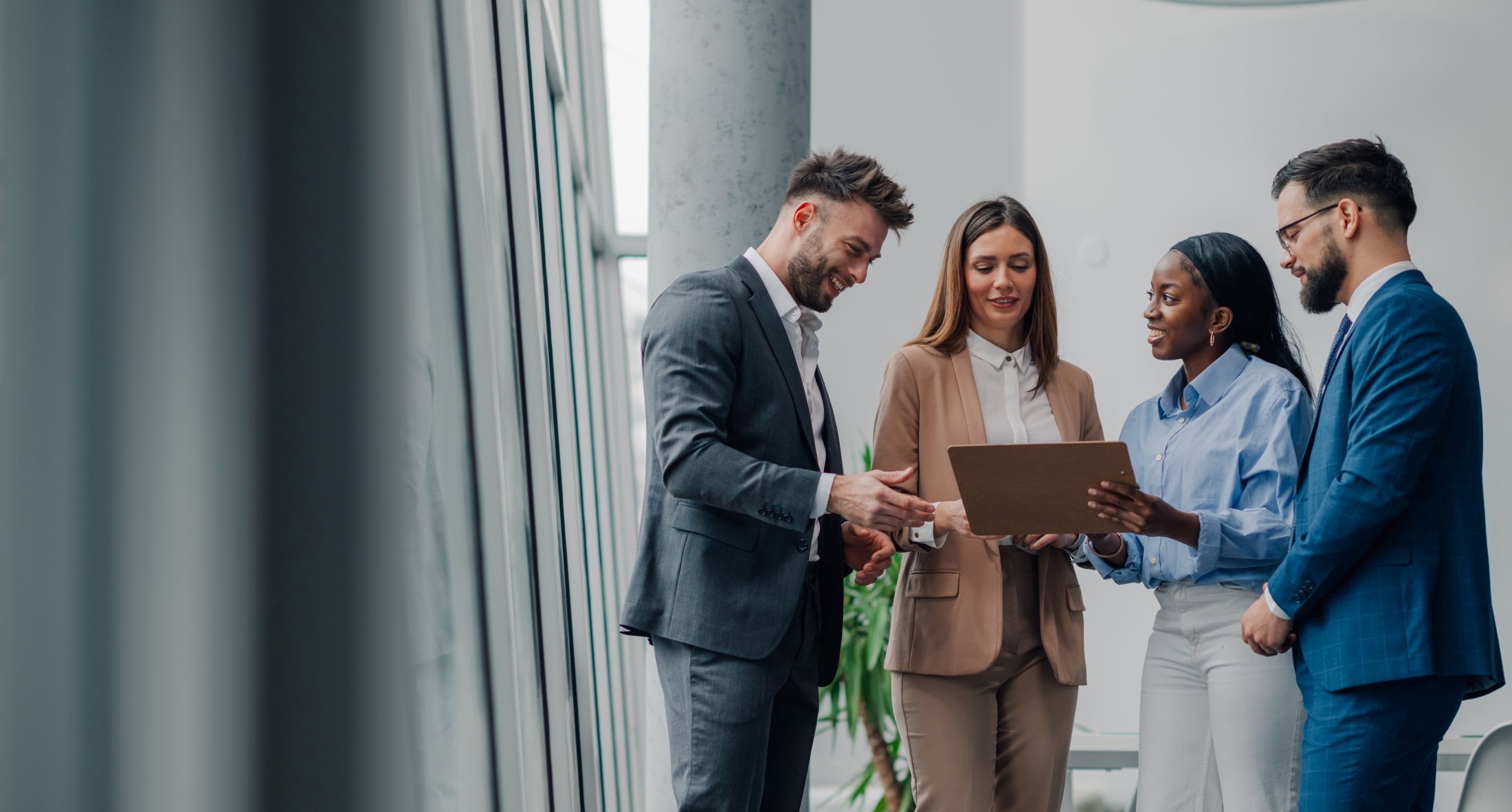 Business owners reviewing an acquisition strategy